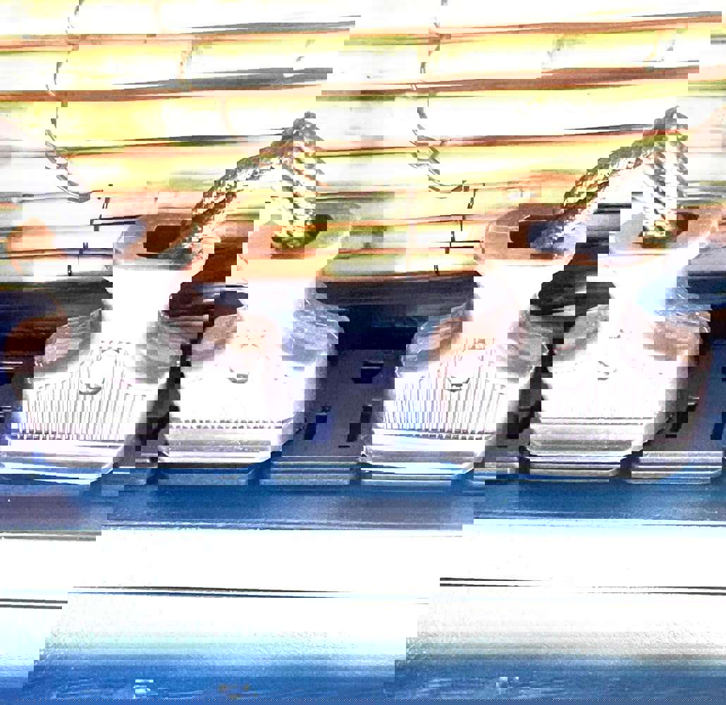 902577