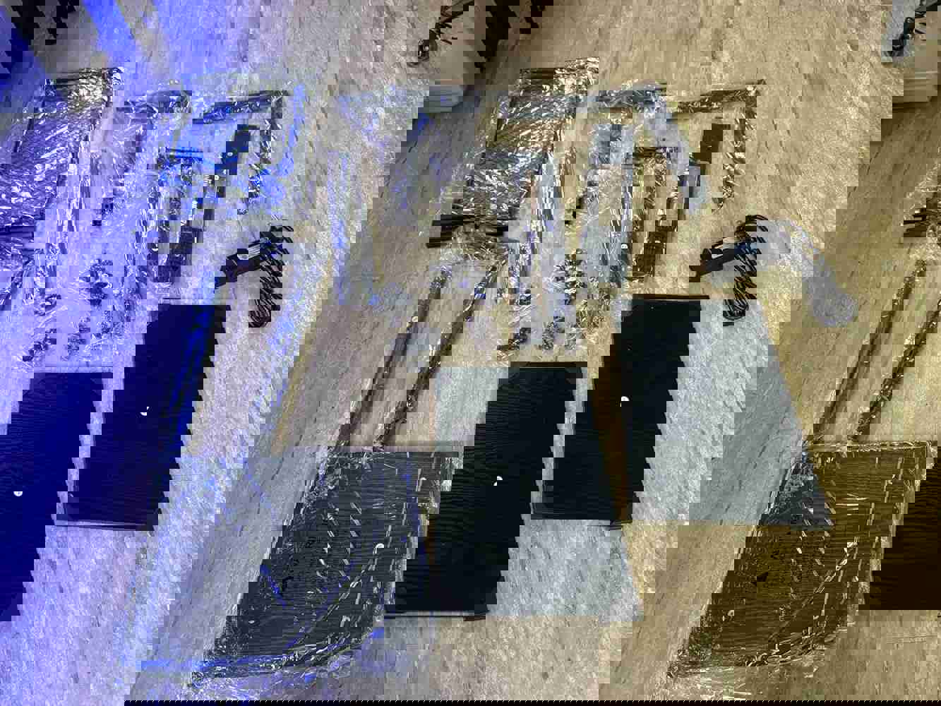 1308643